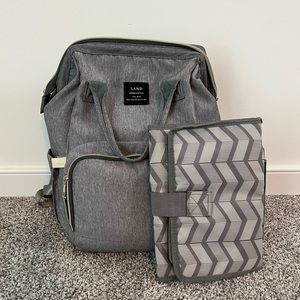 Diaper backpack with changing pad
